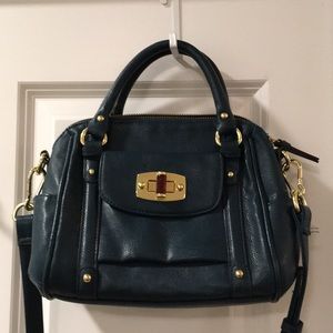 Blue-green faux leather handbag